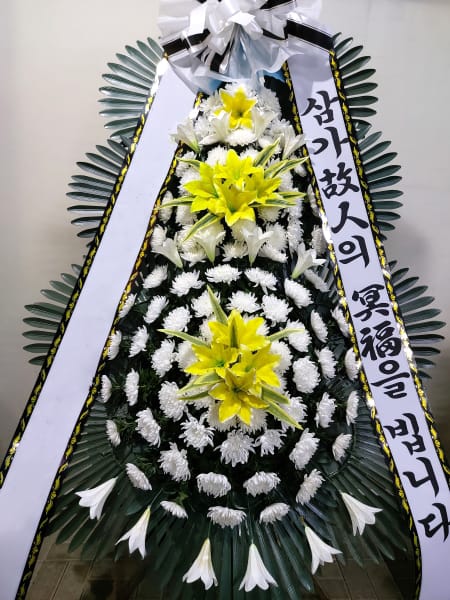 로타리클럽 지구총재 명의의 화환